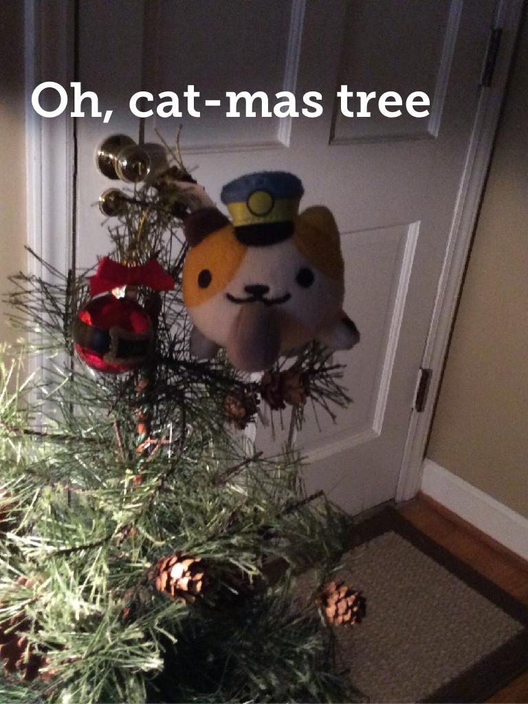 Oh, cat-mas tree With Officer Kit-Kat