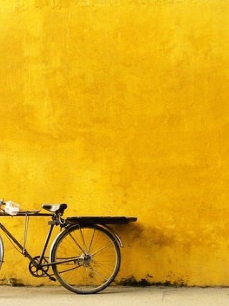 Bike, yellow wall