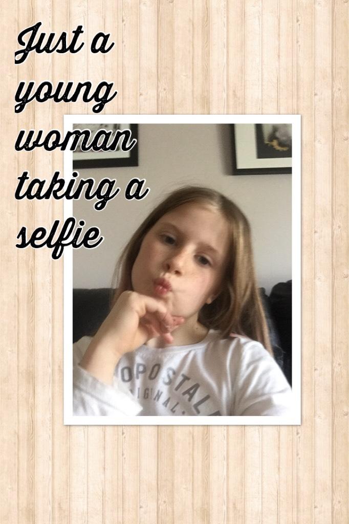 Just a young woman taking a selfie