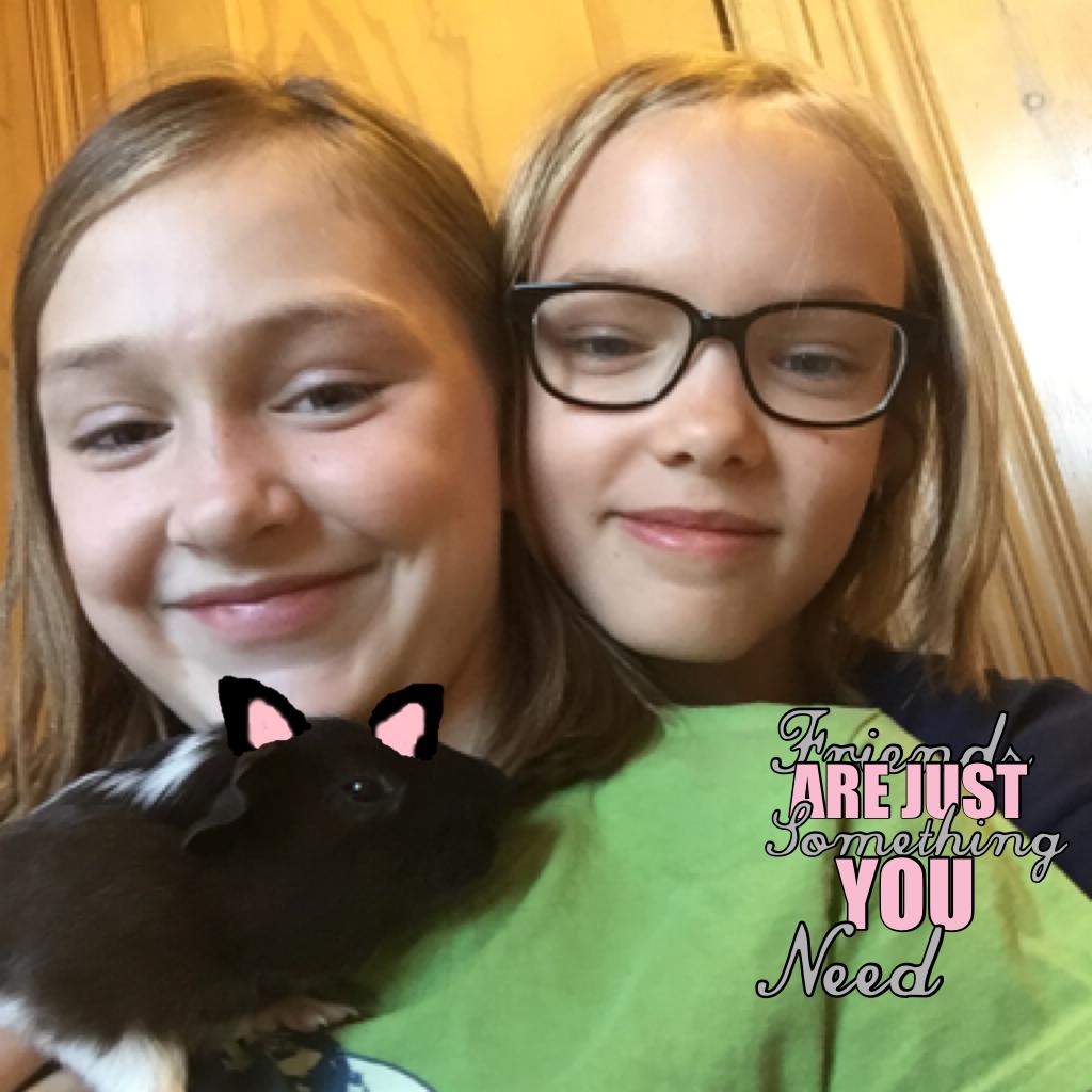  Tap💕
This is a Pic of me 
And my Friend Ruby
I have know her for 
12 years!!🐾
She's Great!🍉
Also that's her Guinea pig
Nibbler!👻