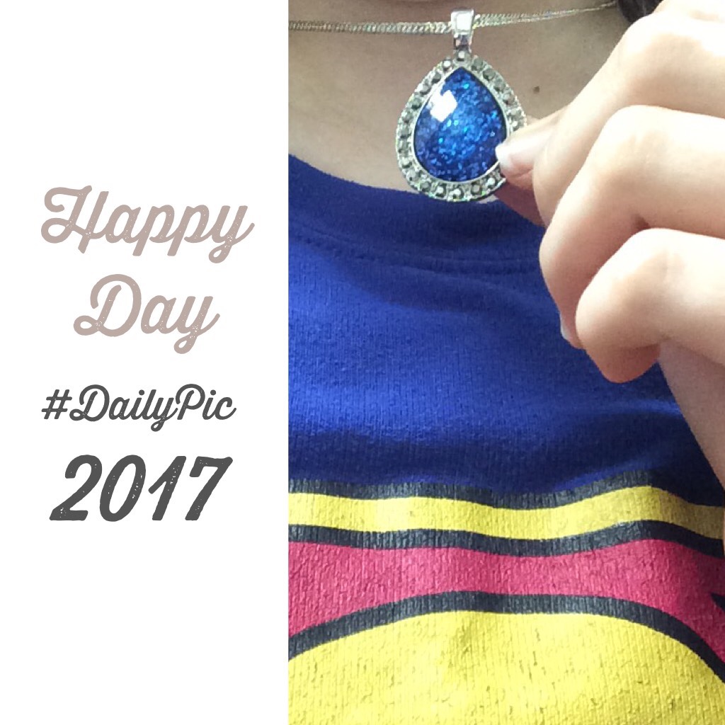Wearin supergirl shirt today. Found this pretty necklace in a bag in my room!