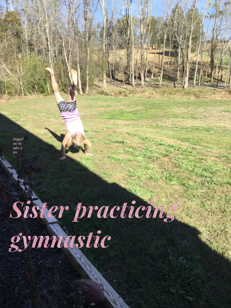 Sister practicing  gymnastic