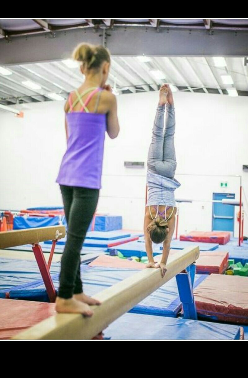 Having fun practicing gymnastics with my sister Lily!! What are you doing today?