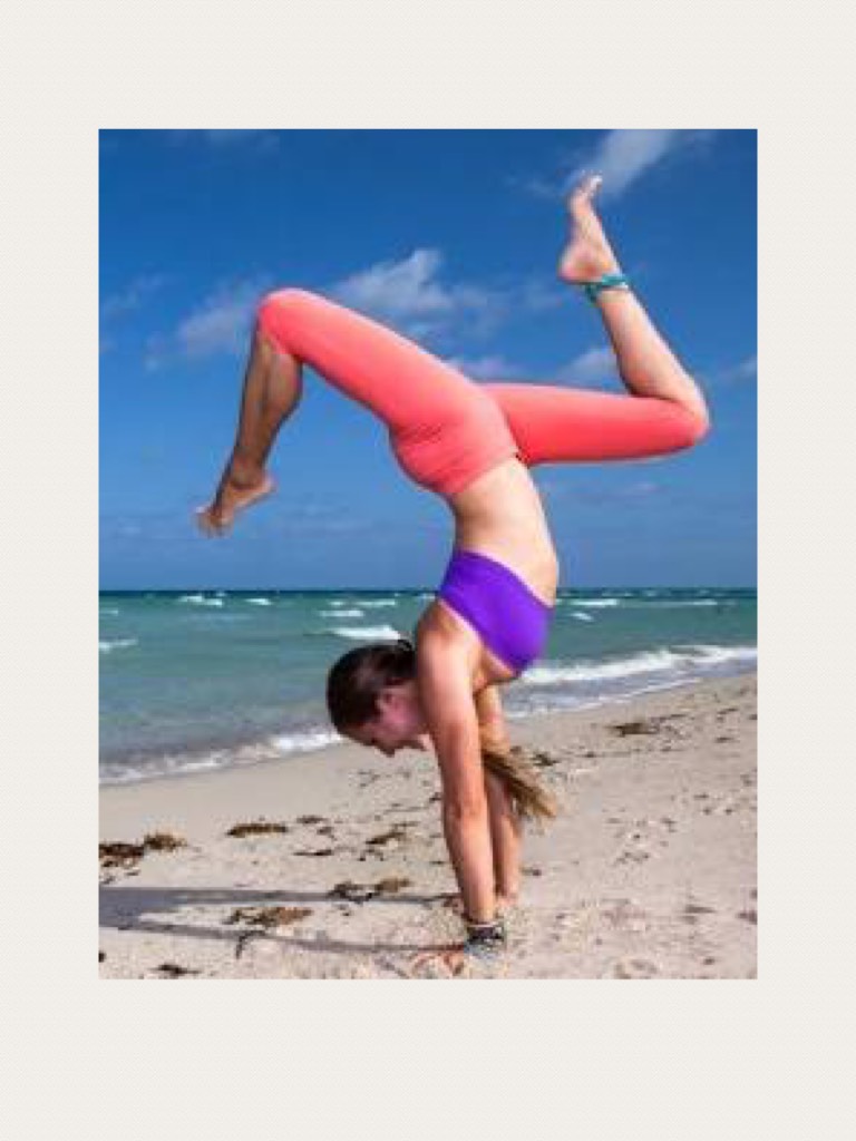 It's a gymnast in the beach 